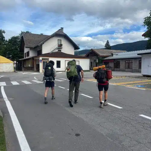 Hikers with backpacks on the Alta Via 1 trail in the Dolomites