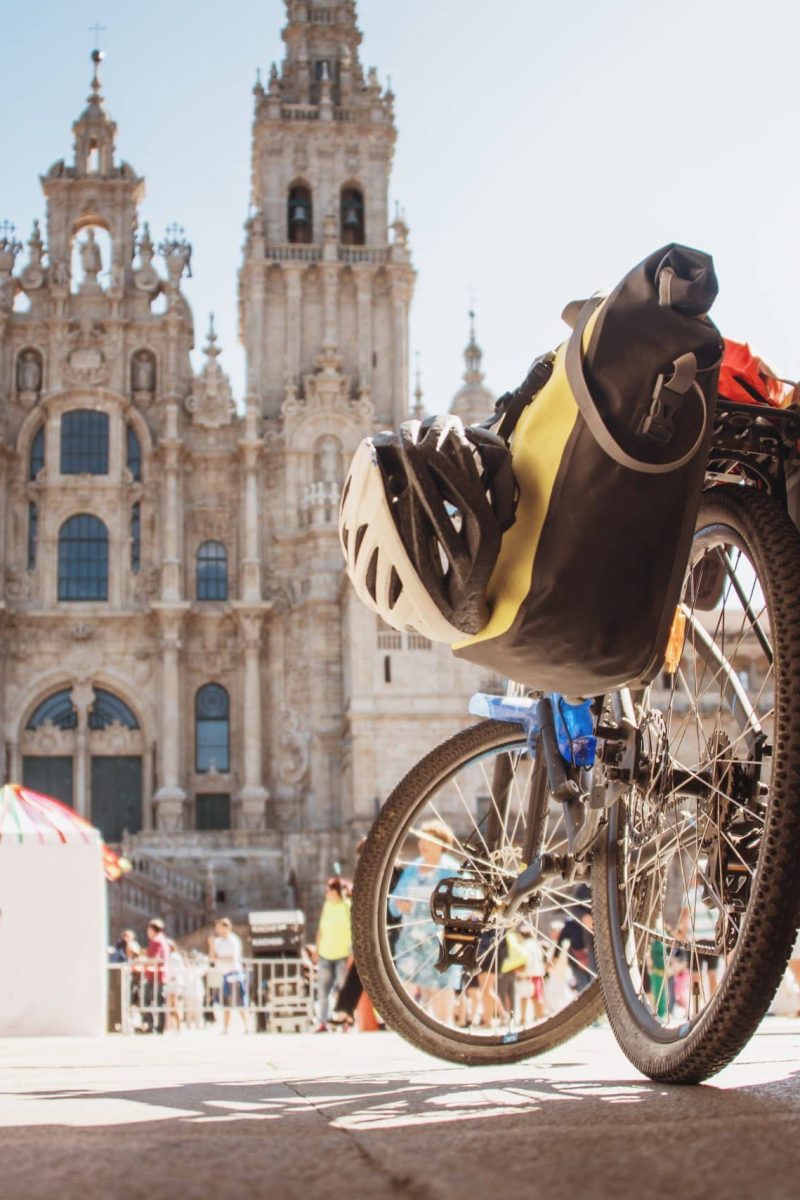 Bicycle by Santiago de Compostela Cathedral in Galicia, Spain. This church is the finish of the 'Camino de Santiago' (Santiago Path) pilgrimage route, which some pilgrims decide to take by bike.